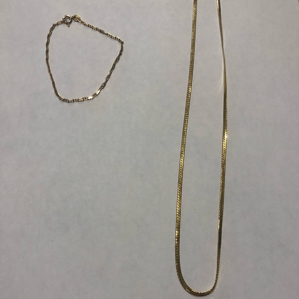 14k bracelet and 750 (18k) chain